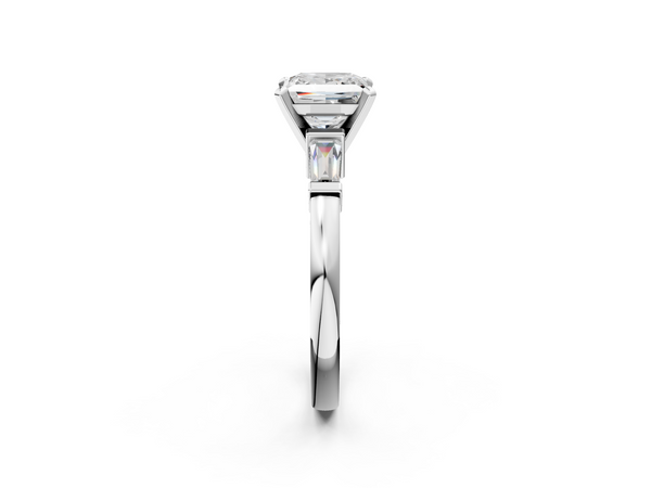 White gold Princess Cut Diamond Solitaire Ring with Tapered Baguette Accents and Four-Prong Setting