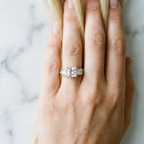 10K White Gold 3.13 Carat E VS1 Princess Diamond Three-Stone Ring with Channel Set Band and Four-Prong Setting