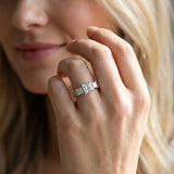 10K White Gold 3.13 Carat E VS1 Princess Diamond Three-Stone Ring with Channel Set Band and Four-Prong Setting