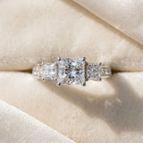 10K White Gold 3.13 Carat E VS1 Princess Diamond Three-Stone Ring with Channel Set Band and Four-Prong Setting