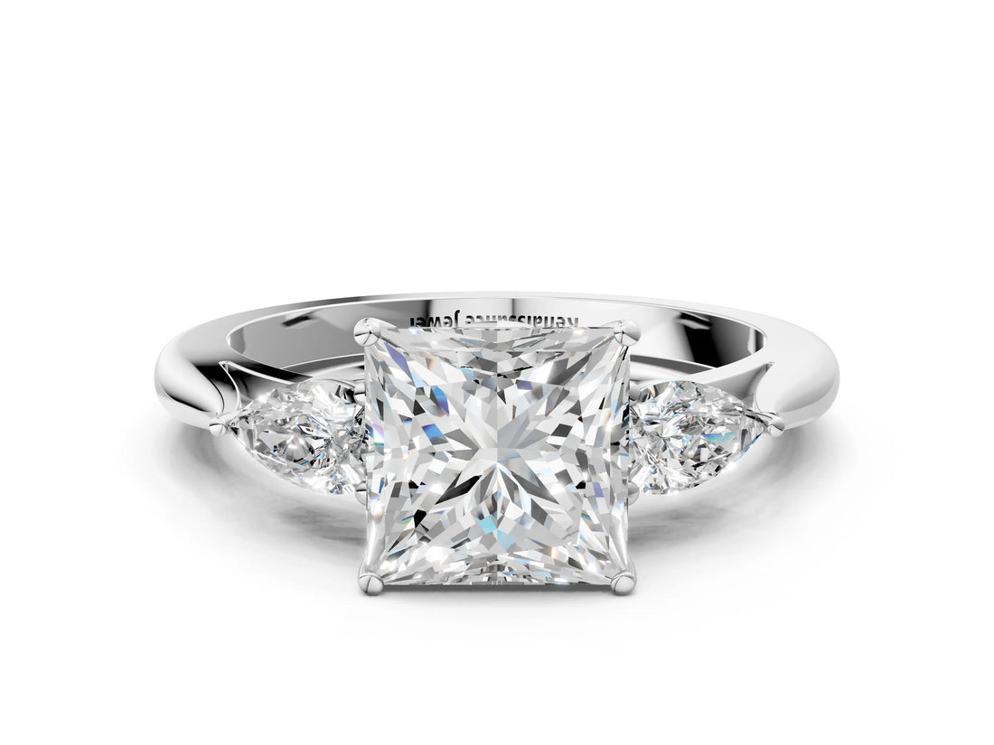 White gold Princess Cut Diamond Three-Stone Ring with Pear Side Stones and Four-Prong Setting_94