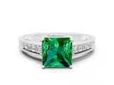 White gold Princess Cut Emerald Engagement Ring with Milgrain Channel Set Band and Prong Setting