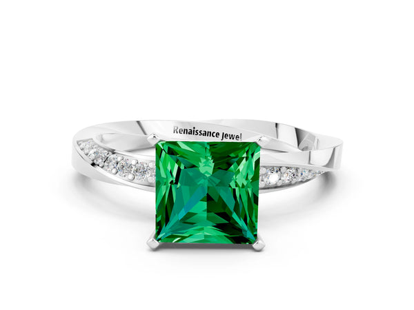 White gold Princess Cut Emerald Engagement Ring with Side Stone Accents and Four-Prong Setting