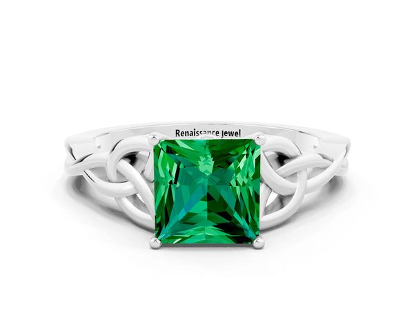 Platinum Princess Cut Emerald Solitaire Engagement Ring with Celtic Knot Band and Four-Prong Setting