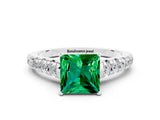 White gold Princess Cut Emerald Solitaire Ring with Cathedral Setting and Pavé Band