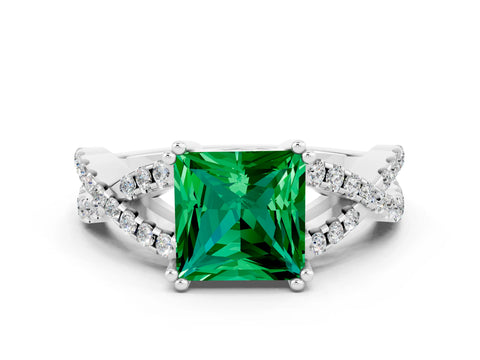 White gold Princess Cut Emerald Solitaire Ring with Four-Prong Setting and Twisted Pavé Band