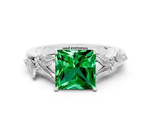 White gold Princess Cut Emerald Solitaire Ring with Leaf Motif Band and Four-Prong Setting