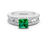 White gold Princess Cut Emerald Solitaire Ring with Pavé and Channel Set Band