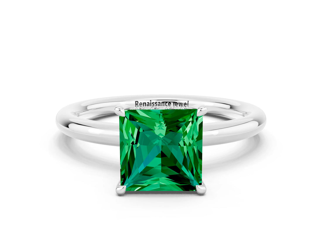 White gold Princess Cut Emerald Solitaire Ring with Thin Band and Four-Prong Setting