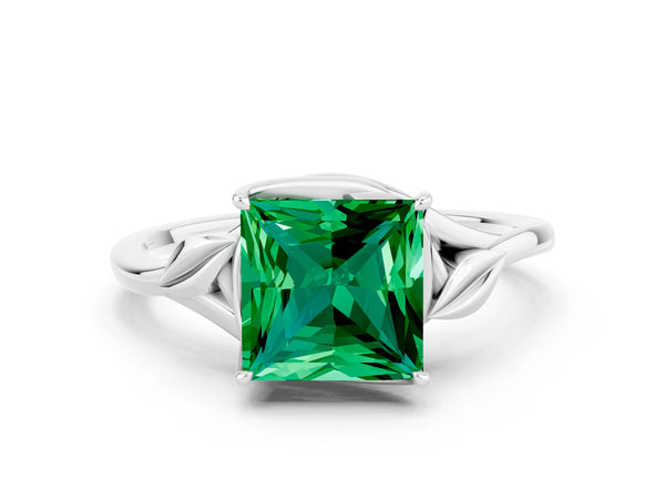 White gold Princess Cut Emerald Solitaire Ring with Twist Band and Four-Prong Setting