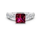 White gold Princess Cut Garnet Prong Setting with Side Stones on a Pave Band