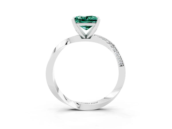 Silver Princess Cut Green Sapphire Engagement Ring with Side Stone Accents and Four-Prong Setting