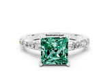 White gold Princess Cut Green Sapphire Solitaire with Side Baguettes and Channel Set Band