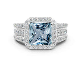 White gold Princess Cut Halo Aquamarine Ring with Split Shank and Four-Prong Setting