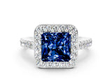 White gold Princess Cut Halo Diamond Ring with Pavé Band and Three-Prong Setting