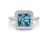 White gold Princess Cut Halo Diamond Ring with Pavé Band and Three-Prong Setting