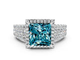 White gold Princess Cut Halo Pavé Diamond Engagement Ring with Split Shank and Four-Prong Setting