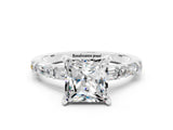 White gold Princess Cut Moissanite Solitaire with Side Baguettes and Channel Set Band