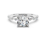 White gold Princess Cut Moissanite Solitaire with Side Stones on a Pavé Band and Four-Prong Setting