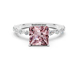 White gold Princess Cut Morganite Solitaire with Side Stones on a Pavé Band and Four-Prong Setting