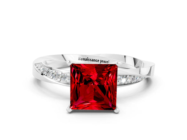 White gold Princess Cut Ruby Engagement Ring with Side Stone Accents and Four-Prong Setting