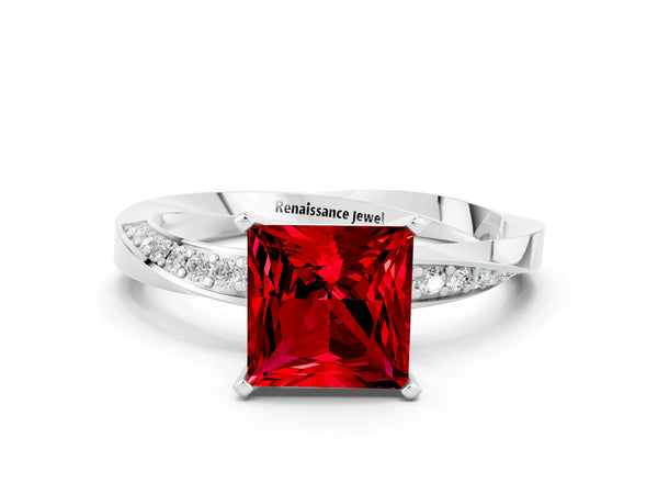 Platinum Princess Cut Ruby Engagement Ring with Side Stone Accents and Four-Prong Setting