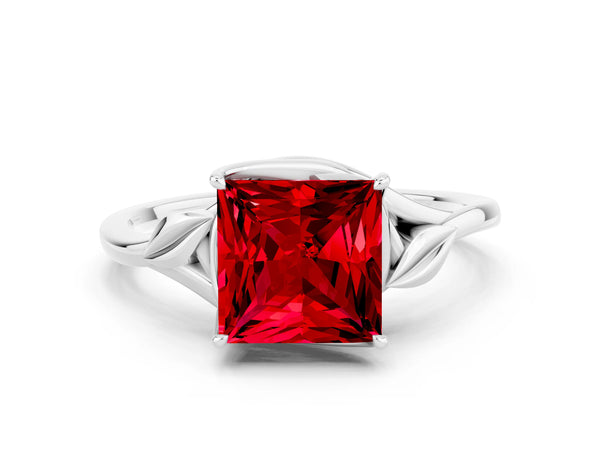 White gold Princess Cut Ruby Solitaire Ring with Twist Band and Four-Prong Setting
