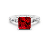 White gold Princess Cut Ruby Solitaire with Side Baguettes and Channel Set Band