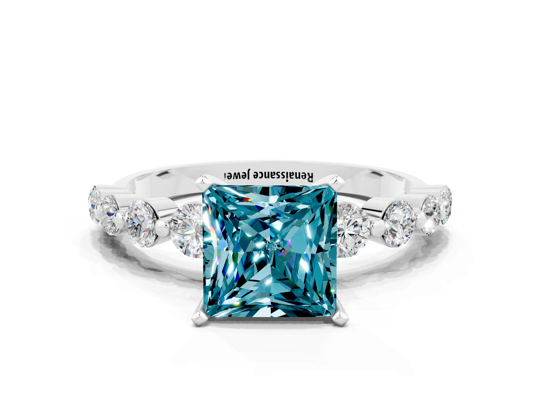 White gold Princess Cut Solitaire Blue Topaz Ring with Pave Band and Four-Prong Setting