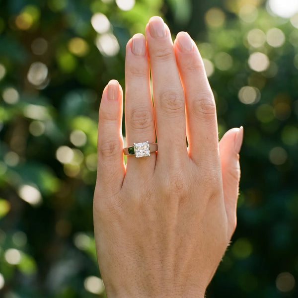 White gold Princess Cut Solitaire Engagement Ring with Cathedral Setting and Four-Prong Setting