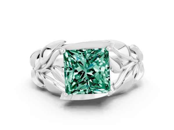 Silver Princess Cut Green Sapphire Leaf-Inspired Engagement Ring with Round Accents and Prong Setting