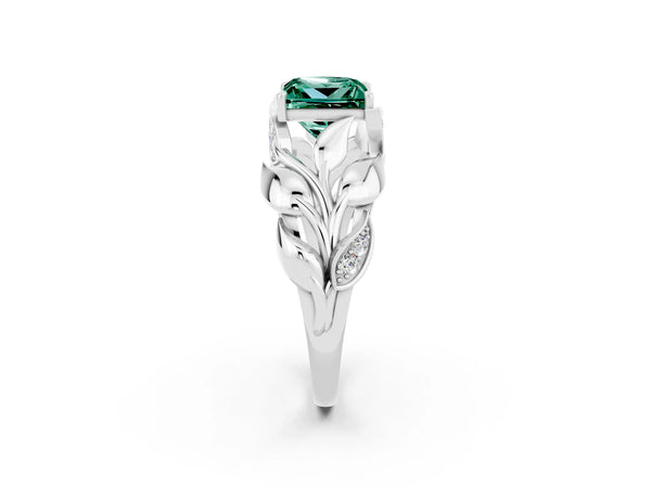 Platinum Princess Cut Green Sapphire Leaf-Inspired Engagement Ring with Round Accents and Prong Setting