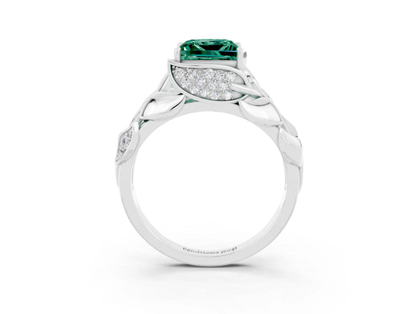 Platinum Princess Cut Green Sapphire Leaf-Inspired Engagement Ring with Round Accents and Prong Setting