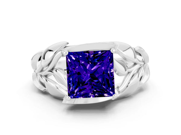 Silver Princess Cut Tanzanite Leaf-Inspired Engagement Ring with Round Accents and Prong Setting