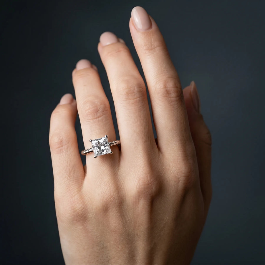 White gold Princess Cut Solitaire Twisted Band Ring with Four-Prong Setting