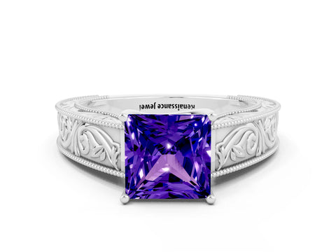 White gold Princess Cut Tanzanite Solitaire Ring with Engraved Band and Four-Prong Setting
