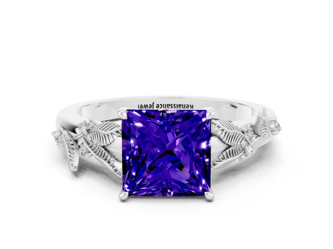 White gold Princess Cut Tanzanite Solitaire Ring with Leaf Motif Band and Four-Prong Setting