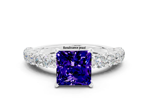 White gold Princess Cut Tanzanite Solitaire Ring with Shared Prong Pavé Band and Four-Prong Setting
