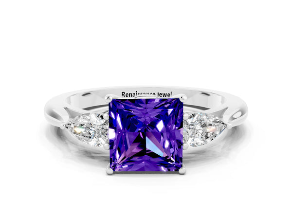 White gold Princess Cut Tanzanite Three-Stone Ring with Pear  Side Stones and Prong Setting