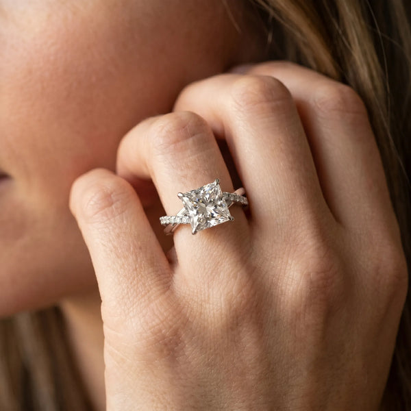 White gold Princess Cut Twist Band Solitaire Diamond Ring with Pavé Setting