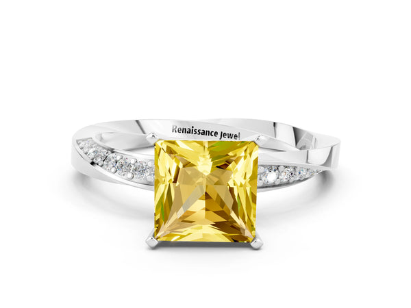White gold Princess Cut Yellow Sapphire Engagement Ring with Side Stone Accents and Four-Prong Setting