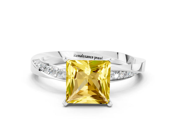 Silver Princess Cut Yellow Sapphire Engagement Ring with Side Stone Accents and Four-Prong Setting