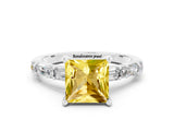 White gold Princess Cut Yellow Sapphire Solitaire with Side Baguettes and Channel Set Band_24