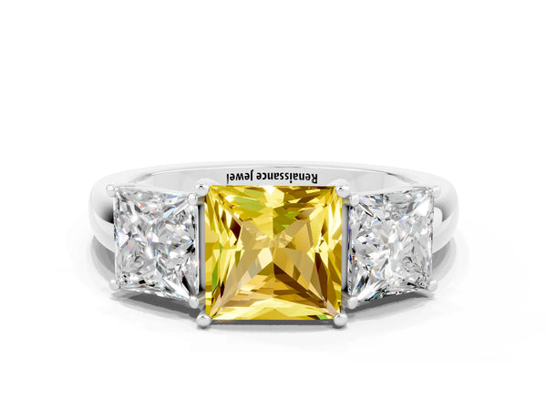 Platinum Princess Cut Yellow Sapphire Three-Stone Ring with Four-Prong Setting and Classic Band