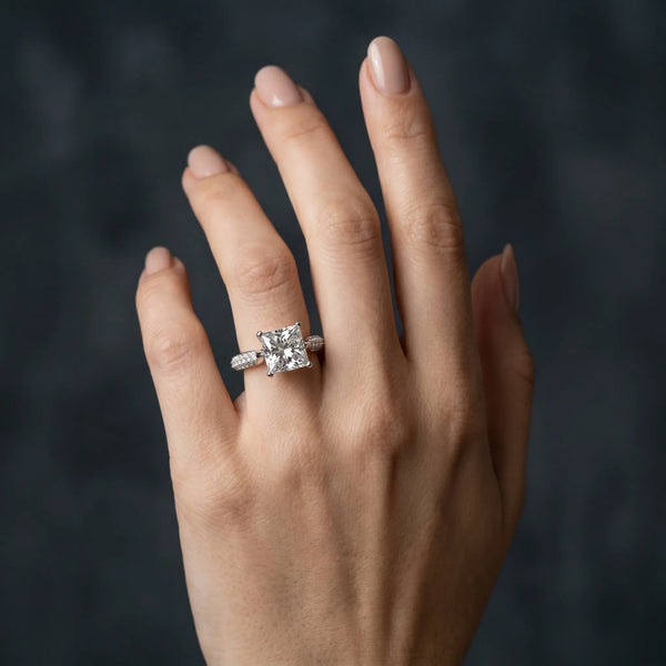 White gold Princess Diamond Solitaire Engagement Ring with Pavé Band and Four-Prong Setting