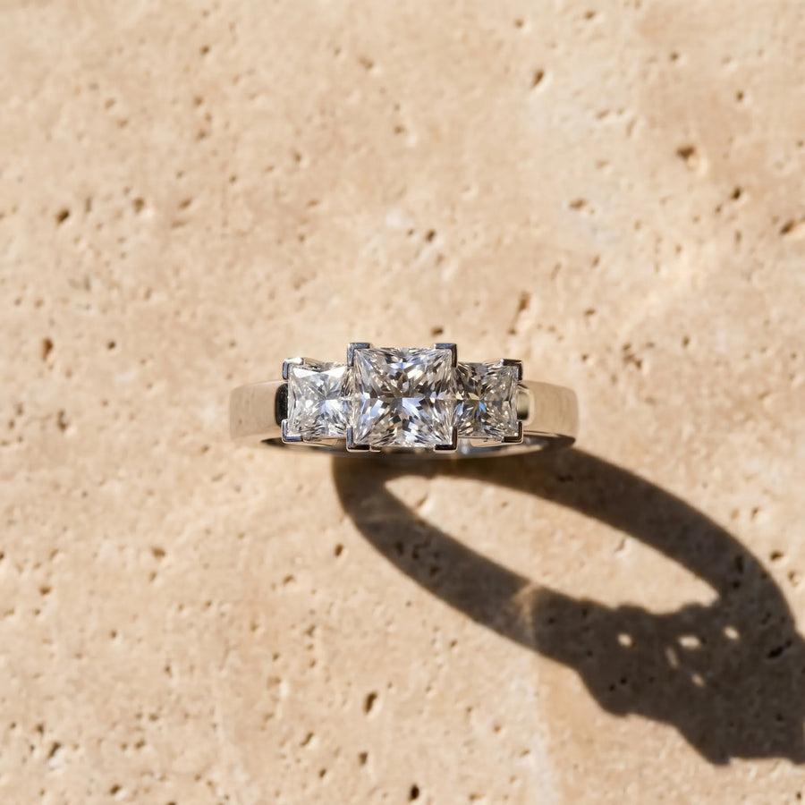White gold Princess Diamond Three-Stone Ring with Prong Setting and Classic Band