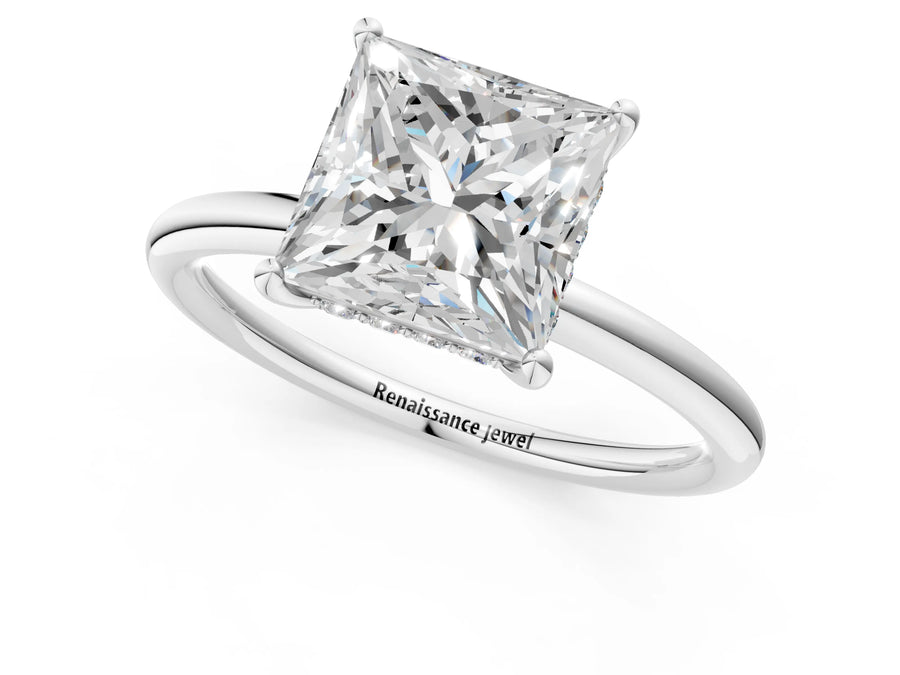 White gold Princess Solitaire Diamond Ring with a Classic Band and Four-Prong Setting