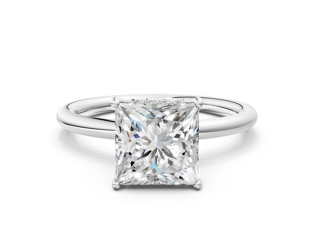 White gold Princess Solitaire Diamond Ring with a Classic Band and Four-Prong Setting