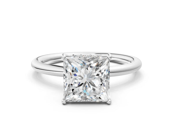 White gold Princess Solitaire Diamond Ring with a Classic Band and Four-Prong Setting