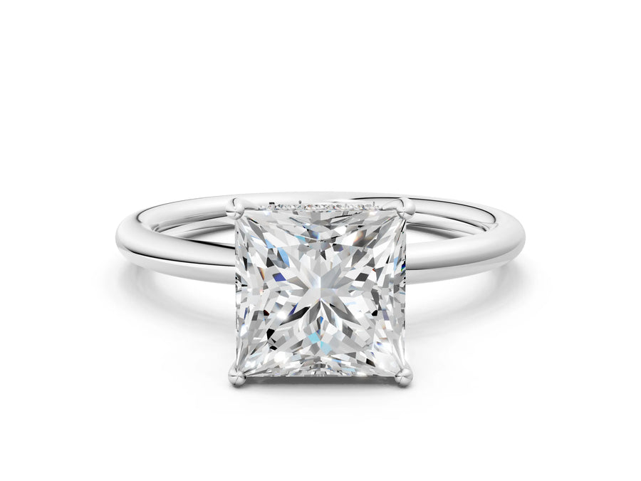 White gold Princess Solitaire Diamond Ring with a Classic Band and Four-Prong Setting